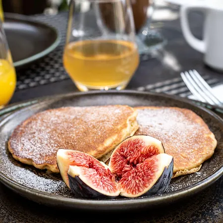 Casa de hóspedes The Address